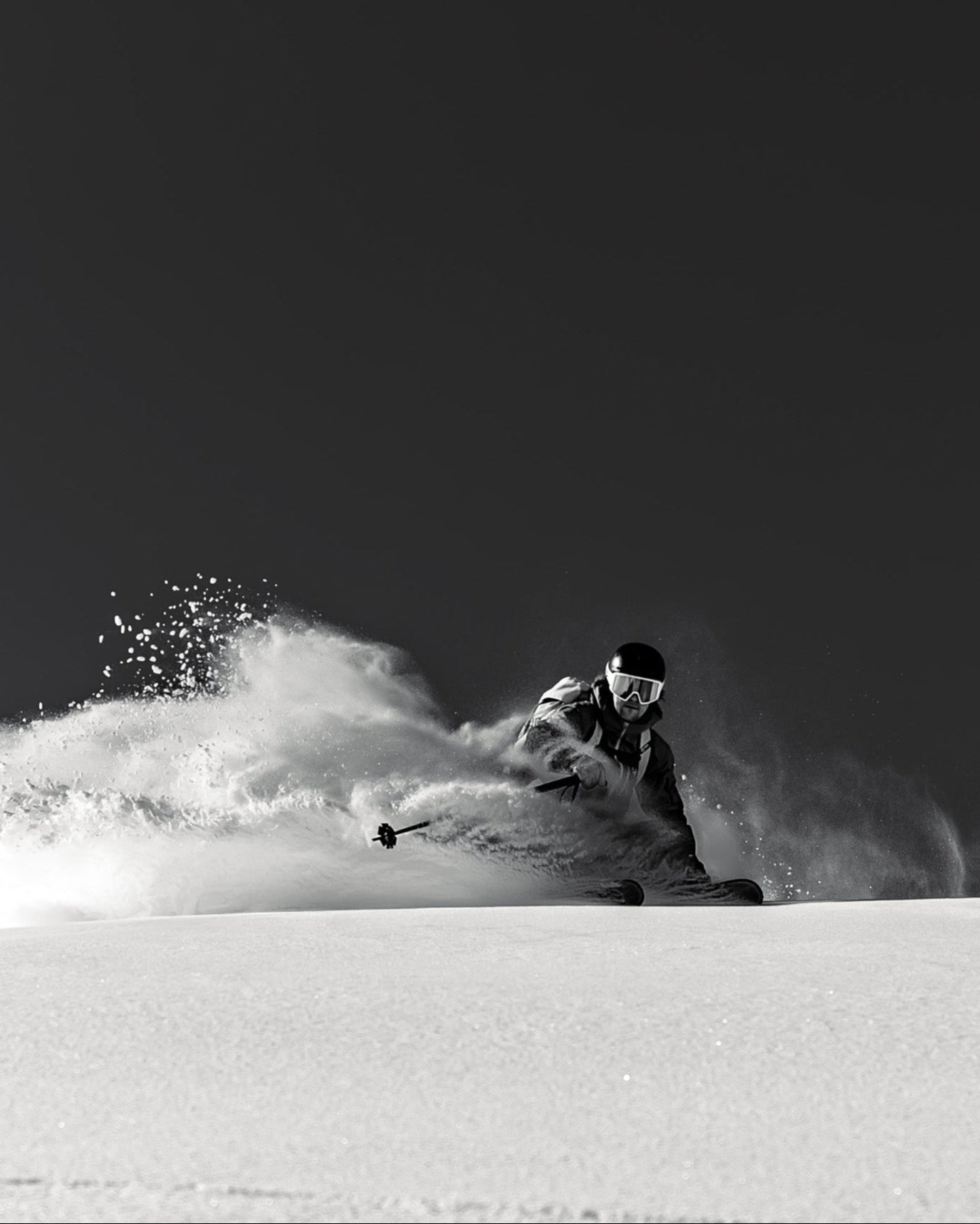 Skier slashing powder in Engelberg with Kang poles adjustable 22